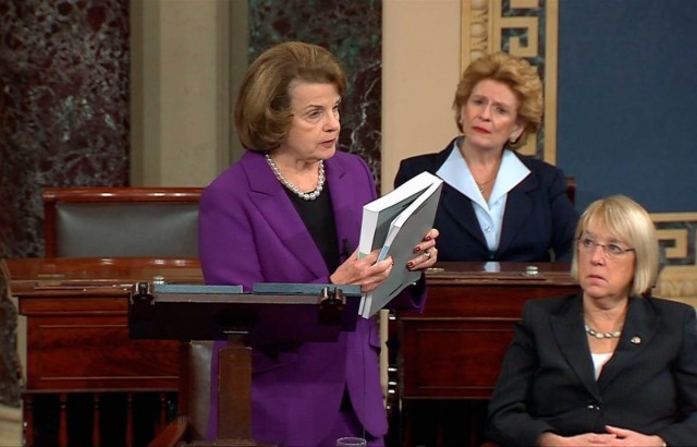 Senate Intelligence Committee Chairwoman Dianne Feinstein (D-CA) (L) discusses a newly released Intelligence Committee report on the CIA's anti-terrorism tactics, in a speech on the floor of the U.S. Senate, in this still image taken from video, on Capitol Hill in Washington December 9, 2014. "Enhanced interrogation" techniques used by the CIA on militants detained in secret prisons were ineffective and never produced information which led to the disruption of imminent terrorist plots, the declassified report found. Looking on, are: U.S. Senators' Debbie Stabenow (D-MI) (rear) and Patty Murray (D-WA) (R).  REUTERS/Senate TV/Handout