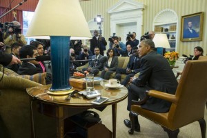 In this Feb. 4, 2015, file photo, President Barack Obama meets with a group of "Dreamers" in the Oval Office of the White House in Washington. A federal judge temporarily blocked Obama’s executive action on immigration Monday, Feb. 16, 2015, giving a coalition of 26 states time to pursue a lawsuit that aims to permanently stop the orders. (AP Photo/Evan Vucci)