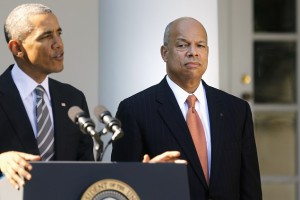 U.S. President Barack Obama (L) announces Jeh Johnson (R) to be his nominee for Secretary of Homeland Security, in the Rose Garden of the White House in Washington, October 18, 2013. Obama on Friday nominated former Pentagon attorney Johnson, a national security expert who had a role in ending the military's ban on gays in the military, to be Homeland Security chief. Johnson, who served as general counsel in the Department of Defense during Obama's first term, would succeed Janet Napolitano, who stepped down earlier this year. His nomination requires Senate confirmation.   REUTERS/Jonathan Ernst  (UNITED STATES - Tags: POLITICS MILITARY) - RTX14G6D