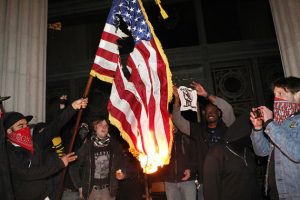 120129-occupy-oakland-goons-burn-american-flag