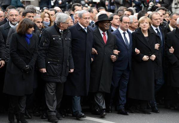 World Leaders walk arm-in-arm in solidarity in France.