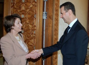 Syria's President Bashar al-Assad (R) shakes hands with U.S. House Speaker Nancy Pelosi (D-CA) in Damascus April 4, 2007. REUTERS/SANA   (SYRIA)