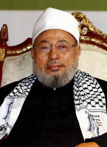 Qatar's Egyptian-born cleric Sheikh Youssef al-Qaradawi attends a protest against Israel over the recent Israeli attacks on the Gaza Strip, at the Qatar Sports Club in Doha, on January 1, 2009. Israel killed a Hamas leader today in the biggest blow yet to the Islamist group's command structure as dozens more air strikes on Gaza took the death toll from the six-day blitz to at least 420. AFP PHOTO/KARIM JAAFAR (Photo credit should read KARIM JAAFAR/AFP/Getty Images)